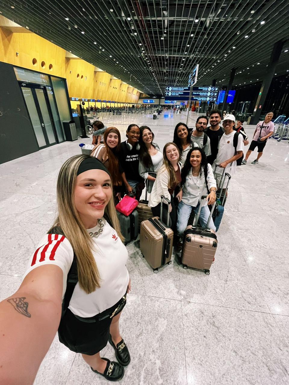 Grupo de clientes da Eklesia no aeroporto